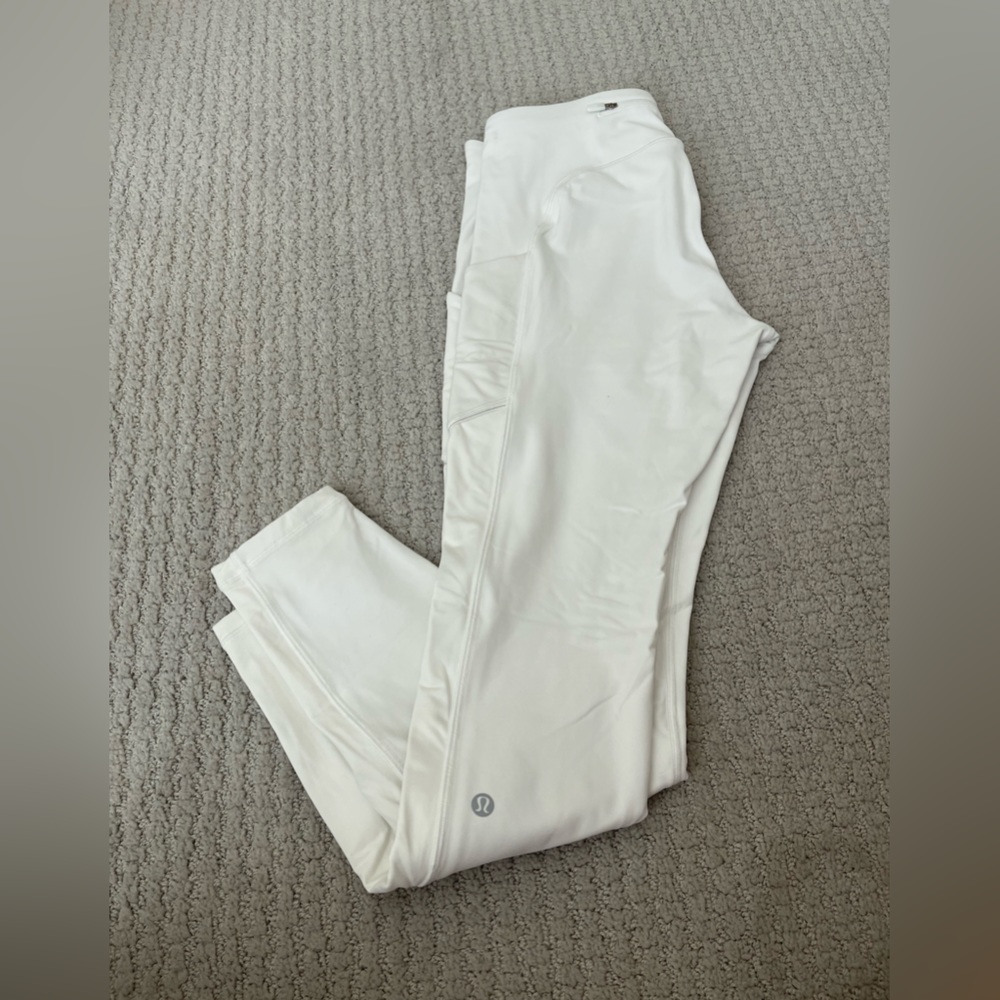 White speed up style, higher mid rise pant with pockets 28”